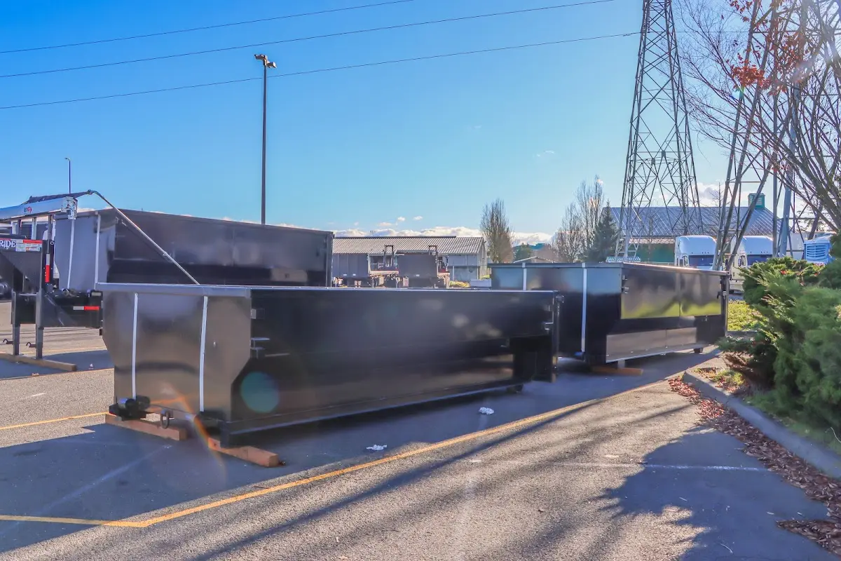 Roll-off dumpster ready for waste disposal at job site for Construction Dumpster Rental in Brewer